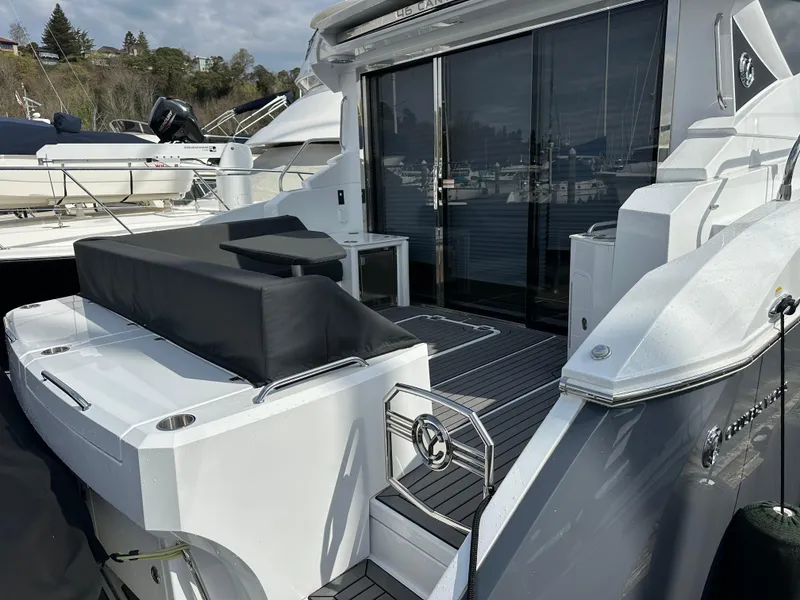 Slide: The Image of 2023 Cruisers Yachts 46 Cantius luxury yacht with sleek design and spacious deck area. - 20
