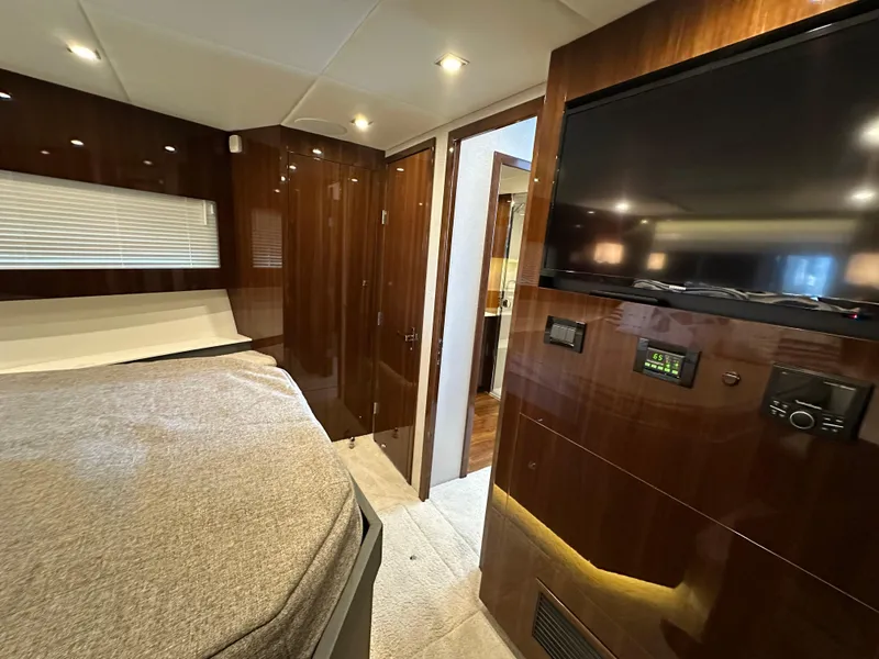 Slide: The Image of Luxurious interior of 2023 Cruisers Yachts 46 Cantius with modern amenities and sleek design. - 23