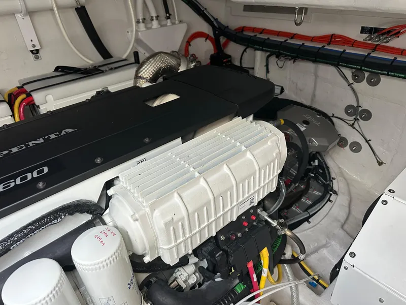 Slide: The Image of Engine room of 2023 Cruisers Yachts 46 Cantius, featuring a Volvo Penta engine. - 41