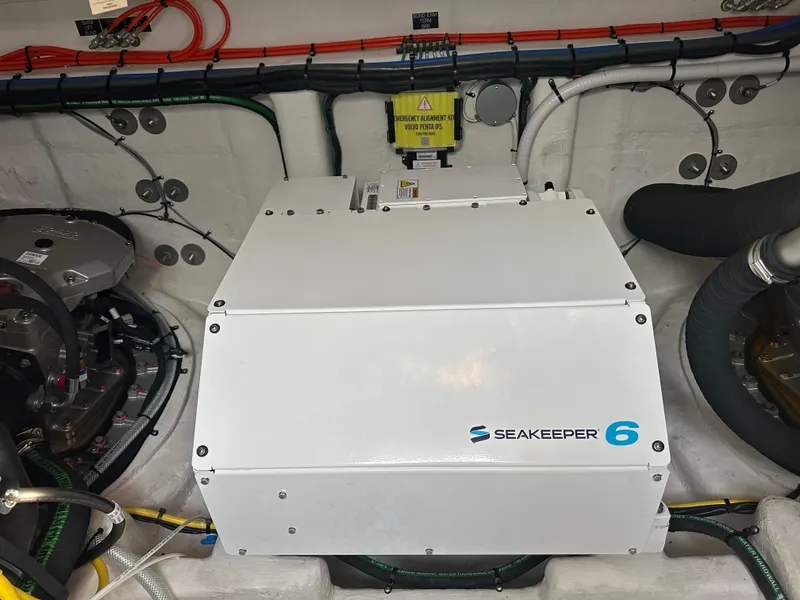 Slide: The Image of Seakeeper 6 stabilizer in 2023 Cruisers Yachts 46 Cantius engine room. - 44