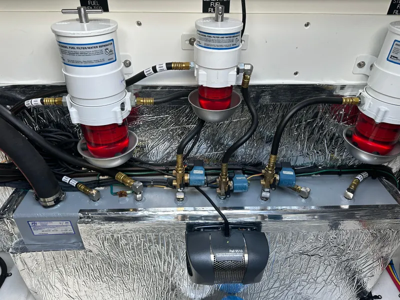 Slide: The Image of Engine compartment of 2023 Cruisers Yachts 46 Cantius with fuel filtration system. - 45