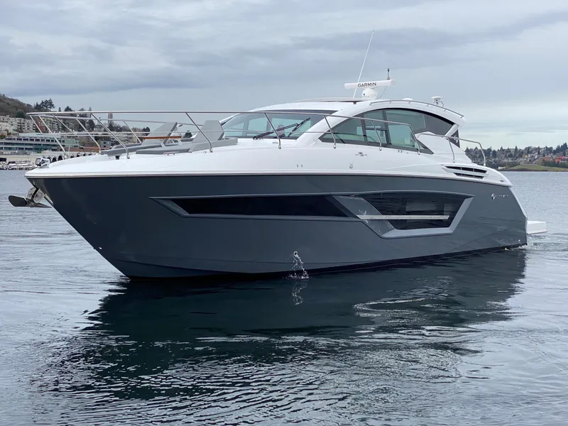 Slide: The Image of 2023 Cruisers Yachts 46 Cantius on calm water, showcasing sleek design and modern features. - 7