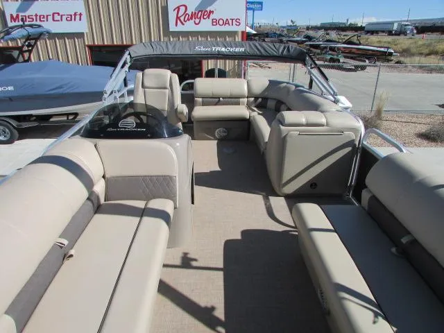 Slide: The Image of 2021 Sun Tracker Party Barge 20 DLX pontoon boat with spacious seating and canopy. - 10