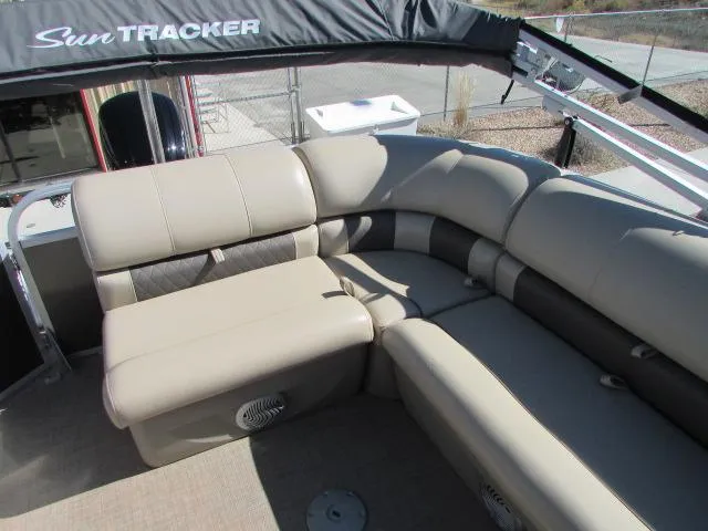 Slide: The Image of 2021 Sun Tracker Party Barge 20 DLX with beige seating and canopy. - 4