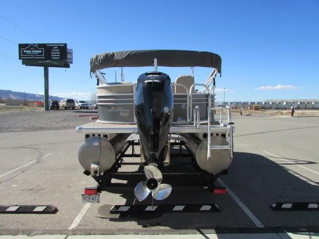 Slide: The Image of 2021 Sun Tracker Party Barge 20 DLX pontoon boat on trailer, rear view. - 8