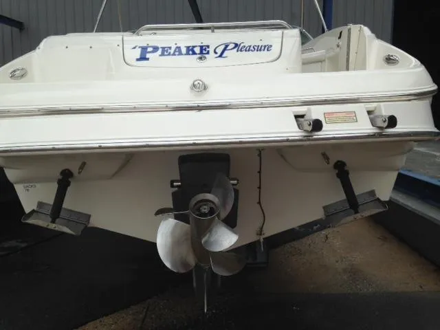 Slide: The Image of Rear view of a 2005 Monterey MONTURA 248 LS boat with visible propeller. - 13