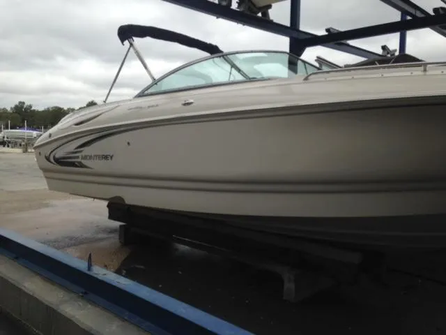Slide: The Image of 2005 Monterey MONTURA 248 LS boat on a lift, side view. - 15