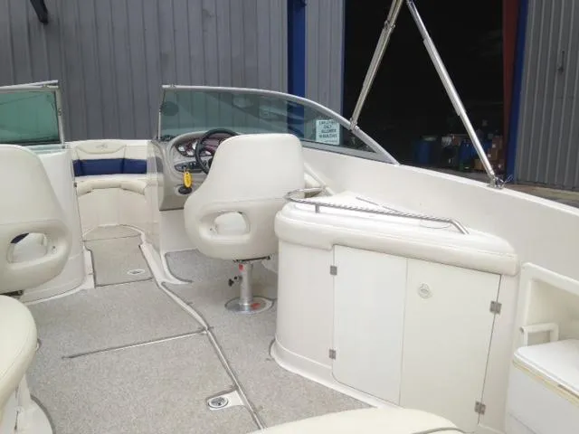 Slide: The Image of 2005 Monterey MONTURA 248 LS boat interior with seating and steering wheel. - 16