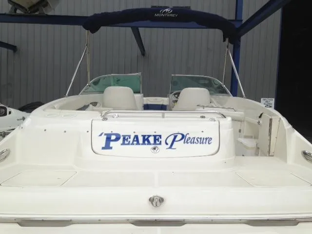 Slide: The Image of 2005 Monterey MONTURA 248 LS boat with "Peake Pleasure" text on the back. - 23