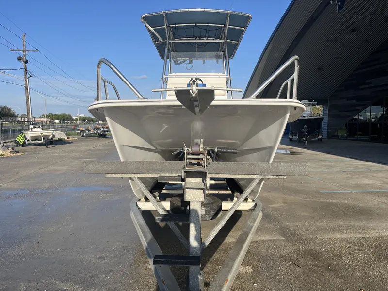 Slide: The Image of 2012 Twin Vee Ocean Cat 22 boat on trailer, parked outdoors. - 3