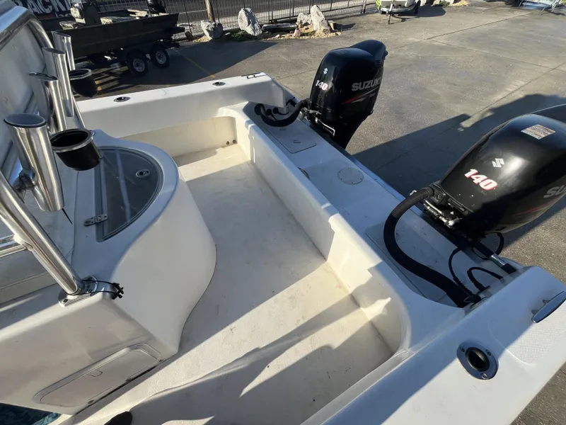 Slide: The Image of 2012 Twin Vee Ocean Cat 22 boat with dual Suzuki 140 engines. - 6