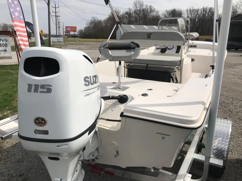 Slide: The Image of 2025 Carolina Skiff 178 JLS boat with Suzuki 115 outboard motor on trailer. - 5