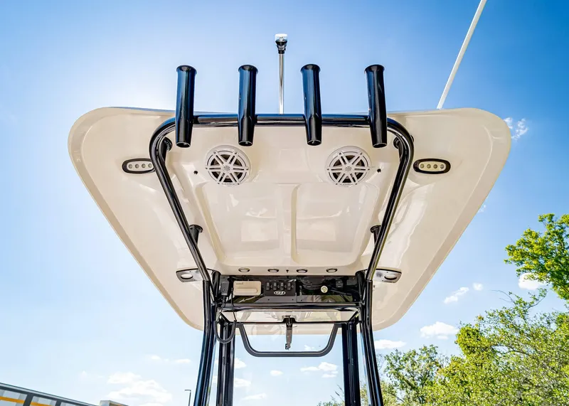 Slide: The Image of 2025 Sea Hunt Ultra 235 SE boat top view with speakers and rod holders. - 11