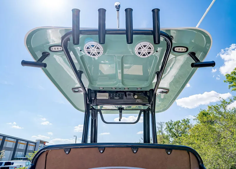 Slide: The Image of 2025 Sea Hunt Ultra 245 SE boat top view with rod holders and speakers. - 18