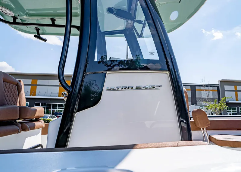 Slide: The Image of 2025 Sea Hunt Ultra 245 SE boat interior with seating and console details. - 6