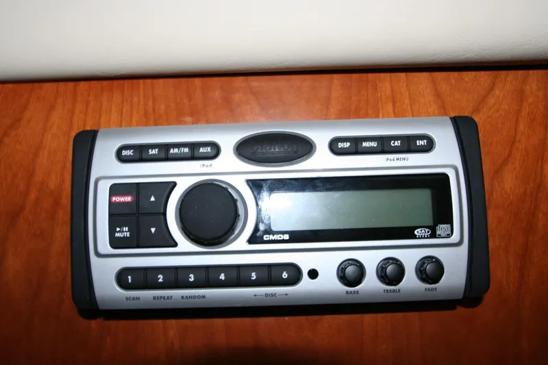 Slide: The Image of 2008 Cruisers Yachts 460 Express stereo system with control panel and display. - 11