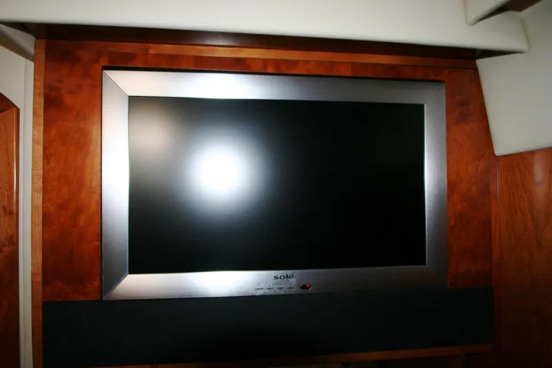 Slide: The Image of Open mini fridge on 2008 Cruisers Yachts 460 Express. - 27