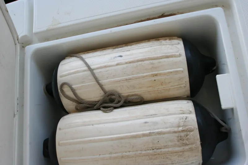 Slide: The Image of Two boat fenders in a 2008 Cruisers Yachts 460 Express. - 34