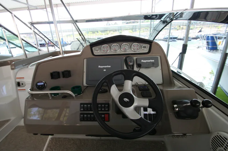 Slide: The Image of 2008 Cruisers Yachts 460 Express under covered dock. - 42