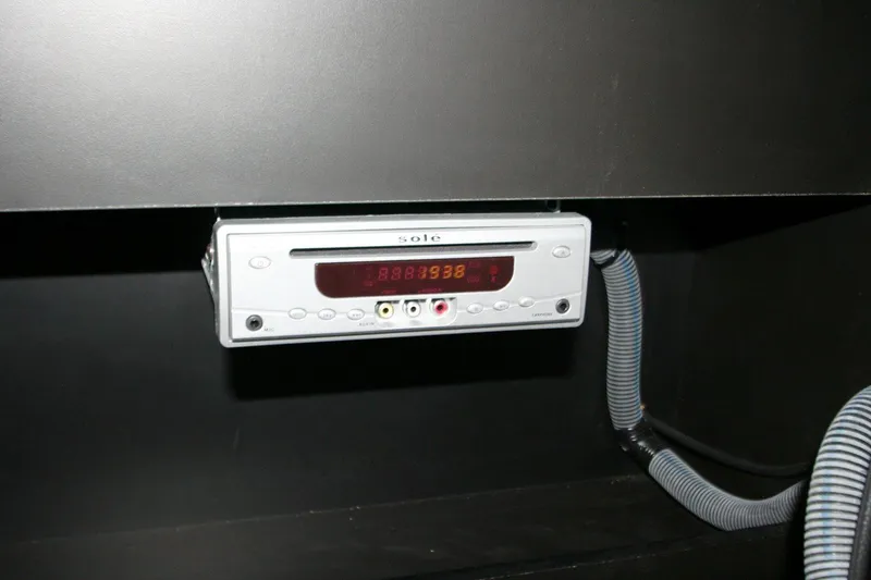 Slide: The Image of Control panel on 2008 Cruisers Yachts 460 Express dashboard, featuring buttons and switches. - 17