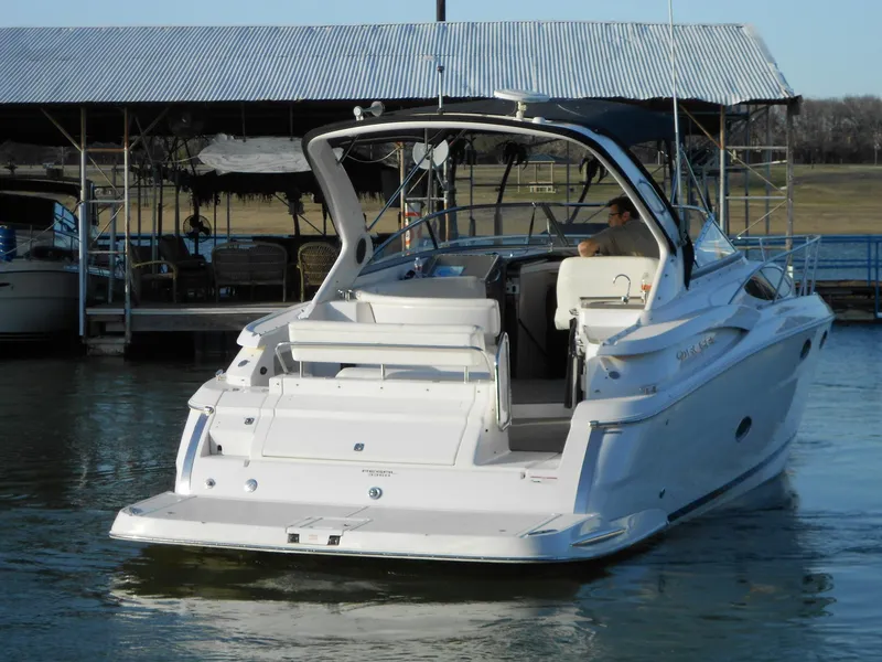 Slide: The Image of 2007 Regal 3360 Window Express boat docked in a marina. - 21