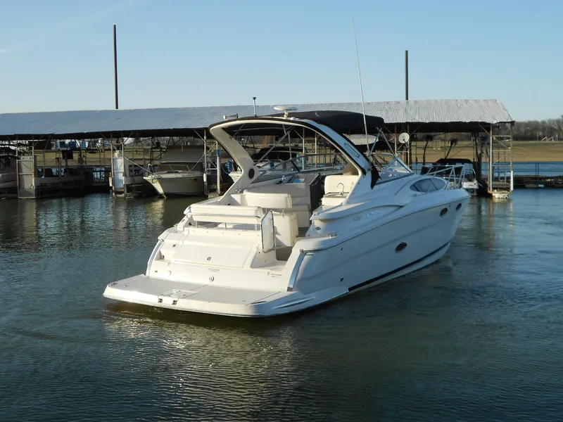 Slide: The Image of 2007 Regal 3360 Window Express boat docked in marina, rear view. - 23