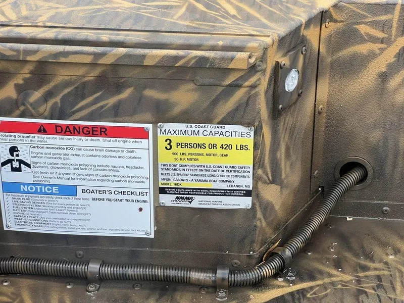Slide: The Image of Safety warning labels on a G3 16 dk boat, 2025 model, detailing capacity and carbon monoxide risks. - 18