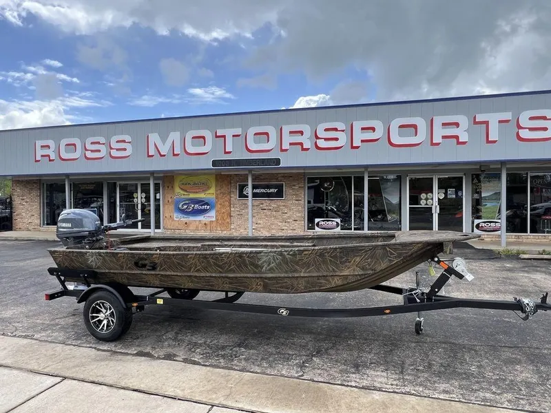 Slide: The Image of 2025 G3 16 dk boat on trailer at Ross Motorsports dealership. - 2
