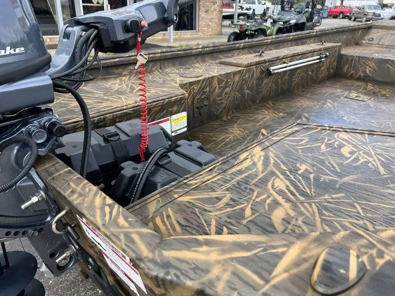 Slide: The Image of Camouflage-patterned G3 16 dk boat interior with motor, 2025 model. - 20