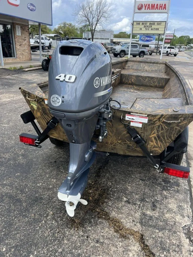 Slide: The Image of Boat with Yamaha 40 outboard motor, parked at dealership, G3 16 dk model, 2025. - 27