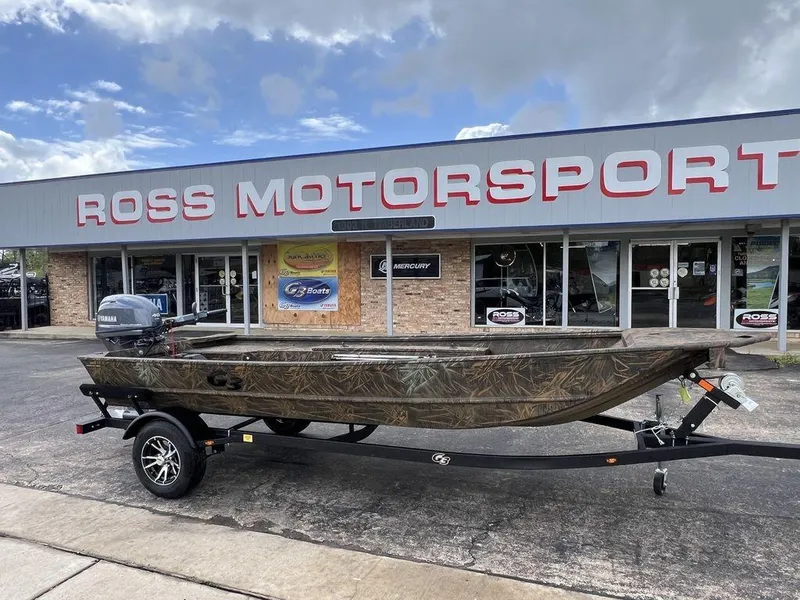 Slide: The Image of 2025 G3 16 dk boat on trailer at Ross Motorsport dealership. - 4