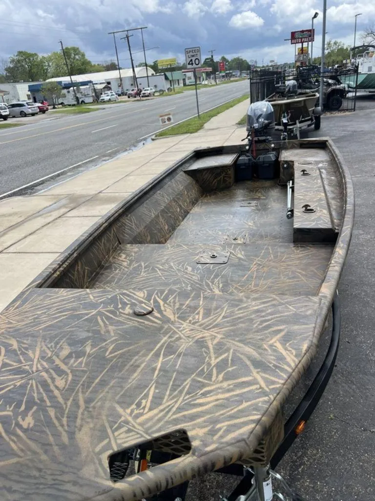 Slide: The Image of 2025 G3 16 dk boat with camouflage design parked on roadside. - 47