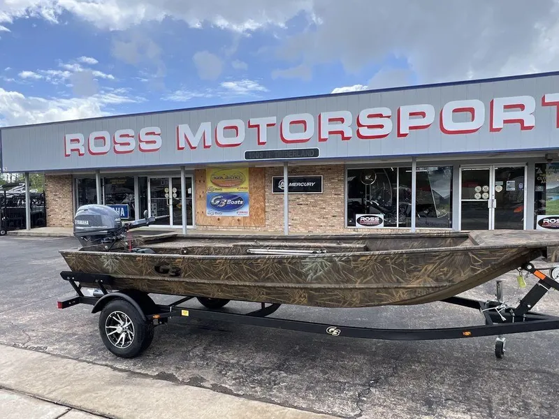 Slide: The Image of 2025 G3 16 dk boat on trailer at Ross Motorsport dealership. - 5