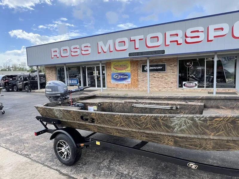 Slide: The Image of Camo-patterned G3 16 dk boat with Yamaha motor at Ross Motorsports dealership, 2025 model. - 7