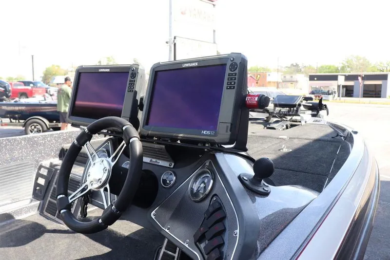 Slide: The Image of 2011 Ranger 518 boat dashboard with dual Lowrance HDS12 fish finders. - 11