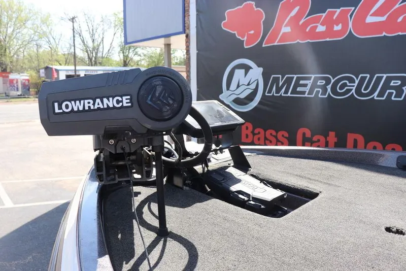 Slide: The Image of Lowrance fishfinder on 2011 Ranger 518 boat, with Bass Cat and Mercury signage in background. - 20