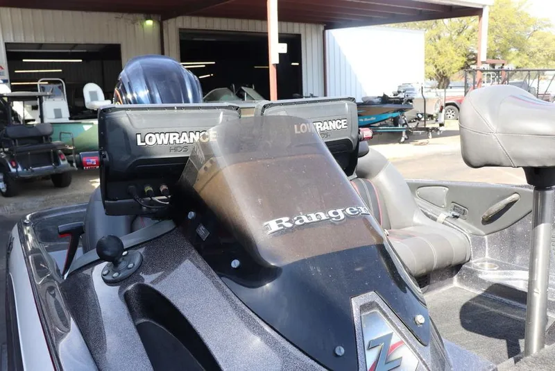 Slide: The Image of 2011 Ranger 518 boat with Lowrance HDS electronics, parked in a garage. - 24