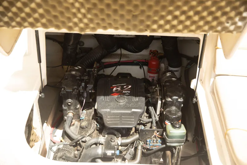 Slide: The Image of Engine compartment of a 2002 Sea Ray 240 Sundeck with MerCruiser 6 MPI engine. - 12