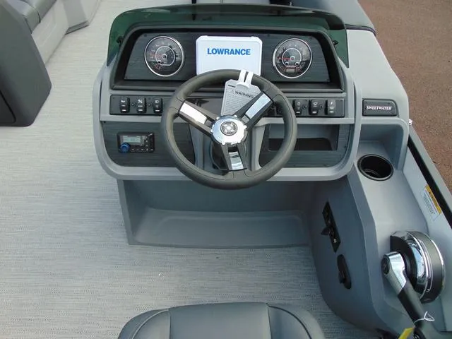 Slide: The Image of 2025 Godfrey Pontoons Sweetwater 2086 C dashboard with steering wheel and control panel. - 12
