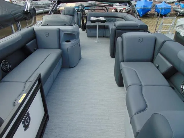 Slide: The Image of 2025 Godfrey Pontoons Sweetwater 2086 C interior with gray seating and modern design. - 3