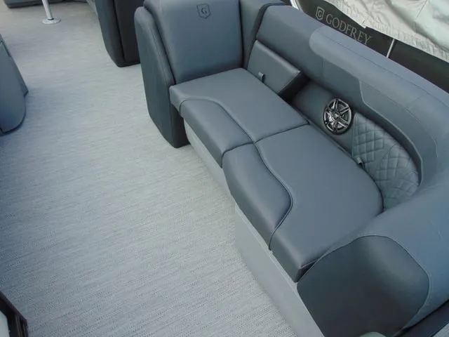Slide: The Image of Luxurious seating on 2025 Godfrey Pontoons Sweetwater 2086 C with premium upholstery and speaker. - 4