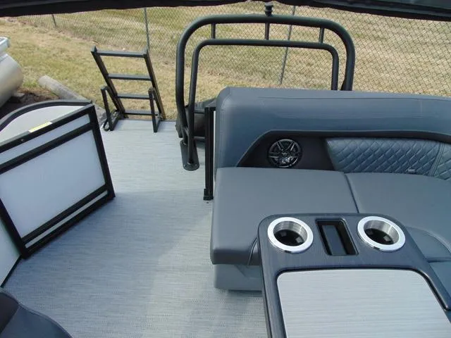 Slide: The Image of 2025 Godfrey Pontoons Sweetwater 2086 C interior with seating and cup holders. - 9
