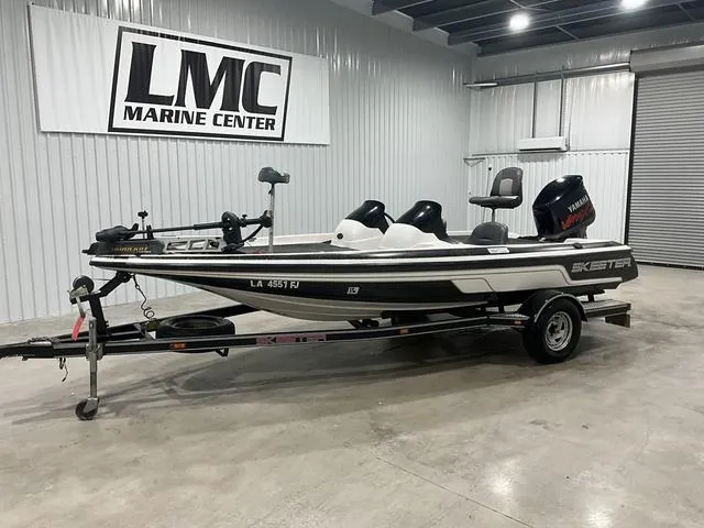 Slide: The Image of 2004 Skeeter SX190 boat on trailer at LMC Marine Center. - 1