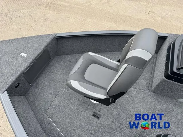 Slide: The Image of 2021 Lund 1675 Adventure Sport boat interior with gray seating and carpeted flooring. - 14