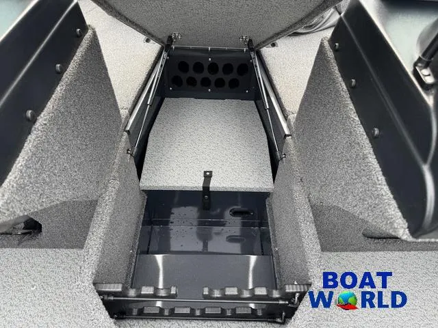 Slide: The Image of 2021 Lund 1675 Adventure Sport boat interior storage compartment, featuring durable construction. - 19