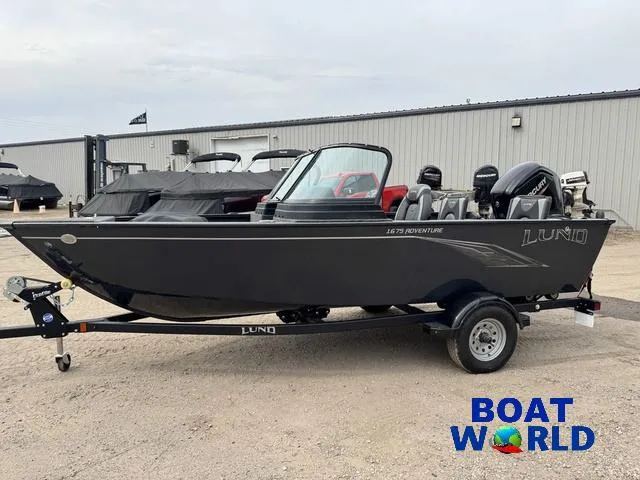 Slide: The Image of 2021 Lund 1675 Adventure Sport boat on trailer at Boat World dealership. - 24