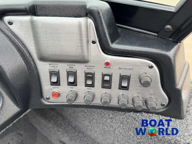 Slide: The Image of Control panel of 2021 Lund 1675 Adventure Sport boat with switches and dials. - 29