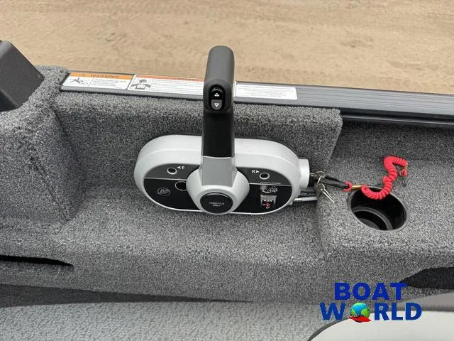 Slide: The Image of 2021 Lund 1675 Adventure Sport boat control panel with throttle and safety lanyard. - 32