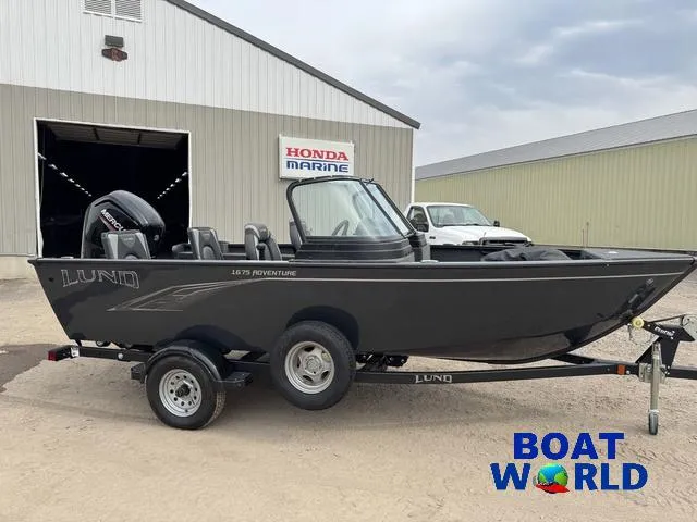Slide: The Image of 2021 Lund 1675 Adventure Sport boat on trailer outside Boat World dealership. - 33