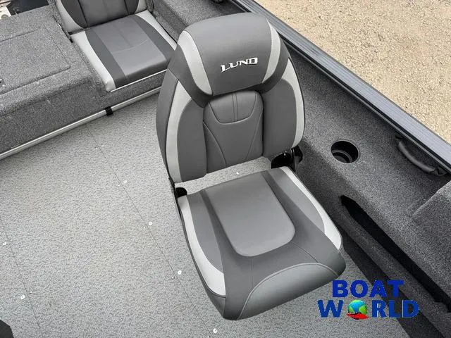 Slide: The Image of 2021 Lund 1675 Adventure Sport boat interior with gray seating and "Boat World" logo. - 35